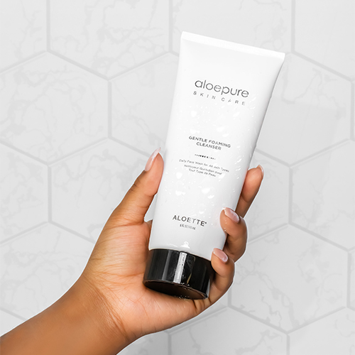 Gentle-Foaming-Cleanser-+-hand-on-contact-paper.jpg