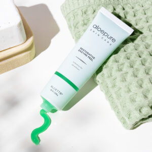Restorative Enzyme Peel Angled Caps off squeezed on towel white 2000